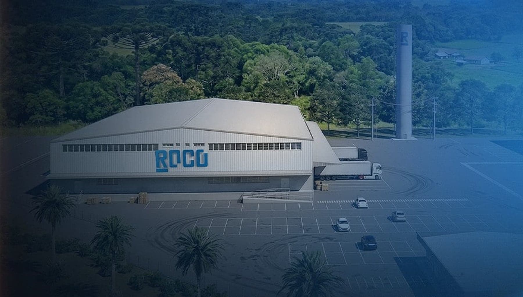 Vista aérea de uma unidade da ROCO, com o galpão identificado pela marca